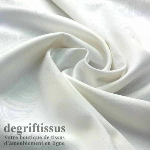 Dégriftissus vous propose ce tissu d&#039;ameublement double face satiné blanc à fleurs striées Vous allez pouvoir agrémenter votre 