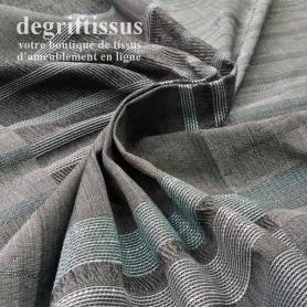 Dégriftissus vous propose ce superbe tissage Jacquard, à larges bandes noires et grises chinées, avec rayures brillantes bleues 